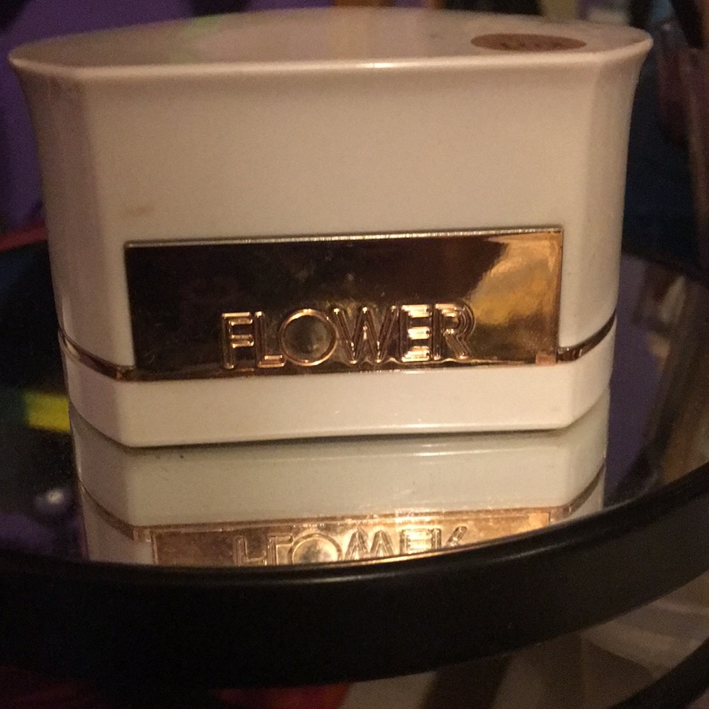 Sweaters, flip flops, Elf makeup, and shorts.